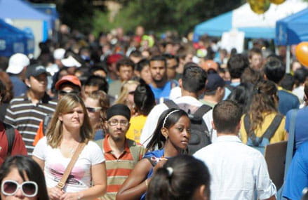 Students at a fair in front of the University Center