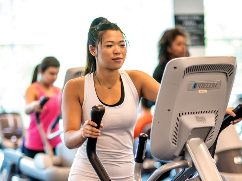 Student on an elliptical machine