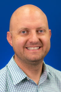headshot of Daniel