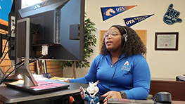 A woman assisting over virtual video call