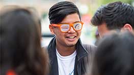 Students meeting and greeting each other on campus