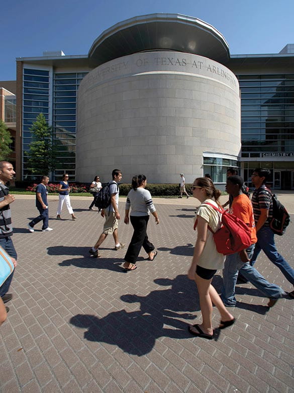 Students walking in front of Chemistry and Physics Building 