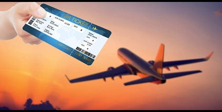 Plane with hand holding ticket