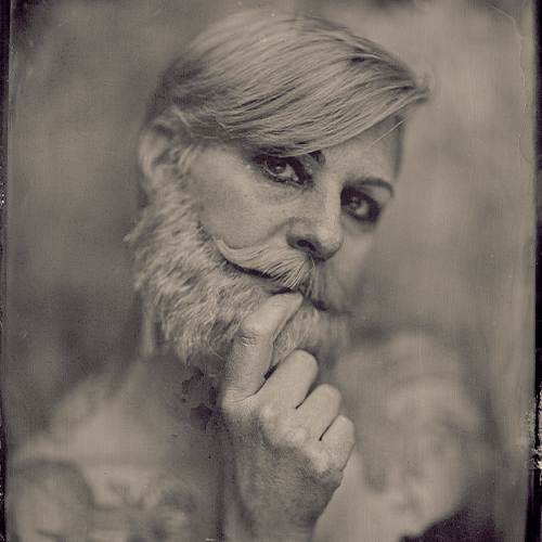 a photo of a woman with a beard