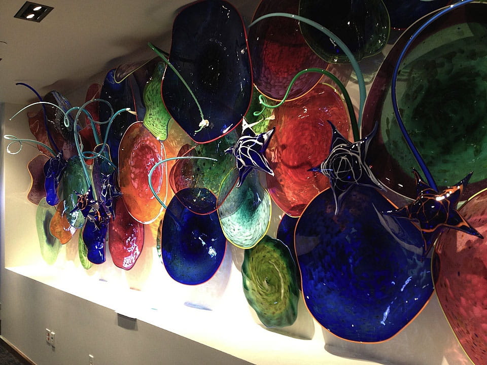 glass art installation on the wall