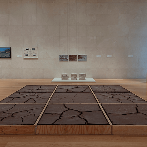 Photo of art exhibit floor in a square pattern