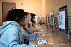 An image of people using computers