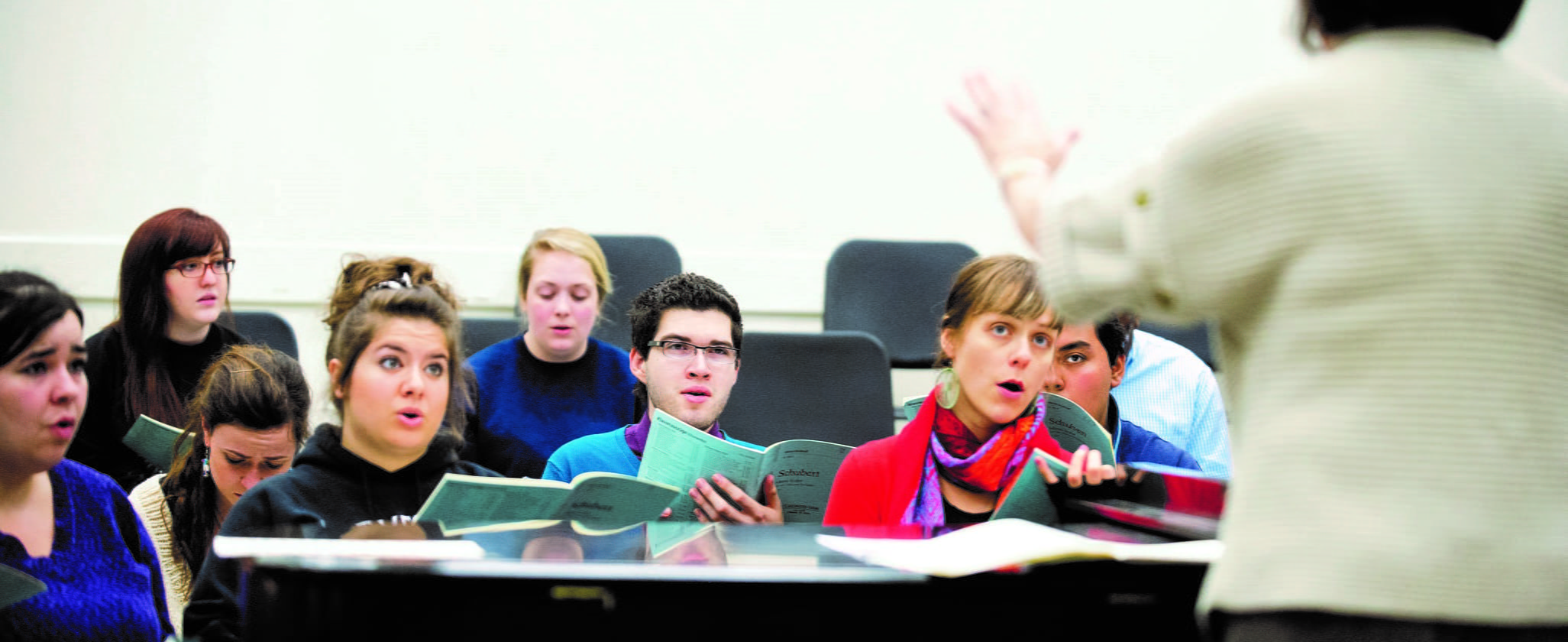 teacher instructing uta music class