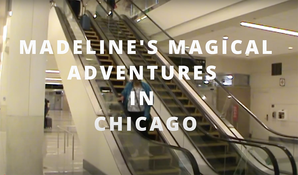 Title overlay with escalator in background