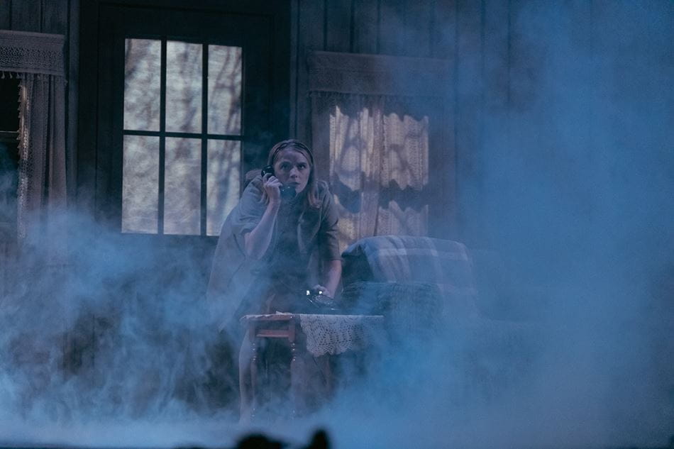 Women on stage with smoke in front