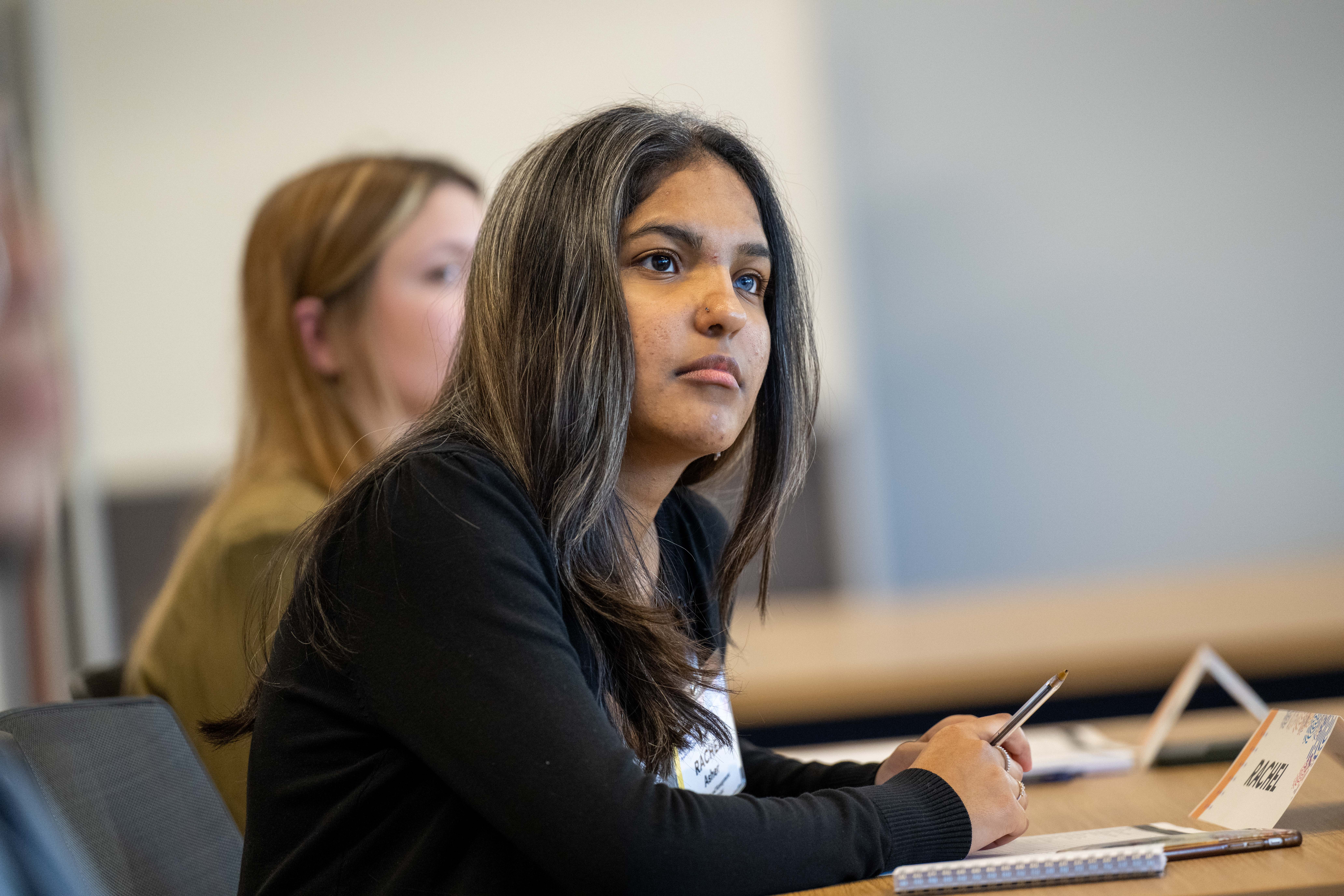 Student taking notes