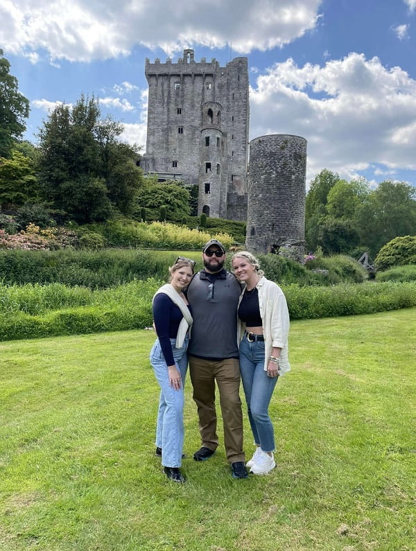 Alex on study abroad trip with fellow students at Blarney Castle in Ireland 