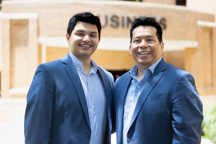 Oswaldo Ortiz Jr. (Oswald) (Left) and Oswaldo Ortiz Sr. (Right) pose in front of the College of Business at the University of Texas at Arlington on May 31, 2024. 