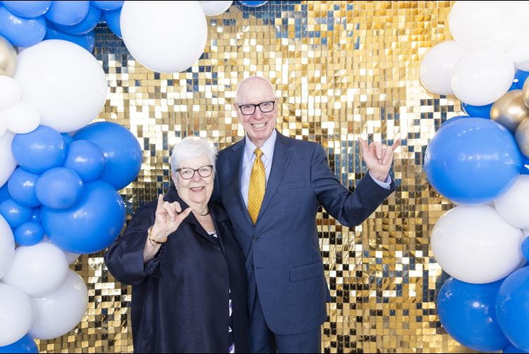 John and Judy Goolsby give the “Go Mavs” hand sign during the Goolsby Leadership Academy 20 Year Anniversary event at the University of Texas at Arlington, April 29, 2024. 