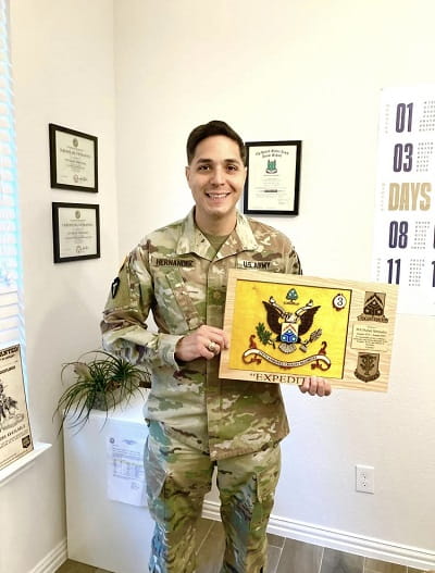 Rafael receiving military recognition  