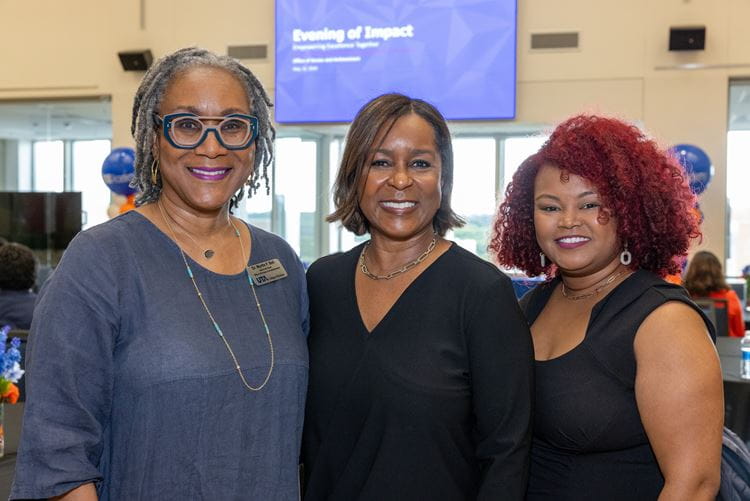 RISE Academy Leadership, Myrtle Bell PhD, Thomas M. McMahon Professor in Business Ethics and Associate Dean of Access and Achievement (Left), Philisa Stanford, Director of Access and Achievement (Middle) and Jhonniece Meeks, Coordinator of Access and Achievement (Right) pose of a photo during the RISE Academy ‘Evening of Impact” event at the University of Texas at Arlington Library on May 16, 2024. 