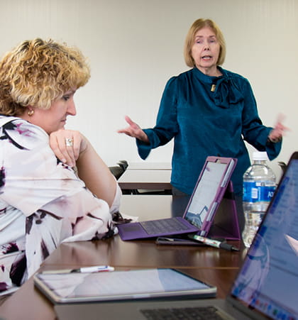 Donna Hamby teaches to a class of doctoral students