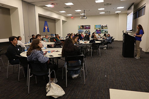 AT Day attendees sitting listening to Laura Kunkel