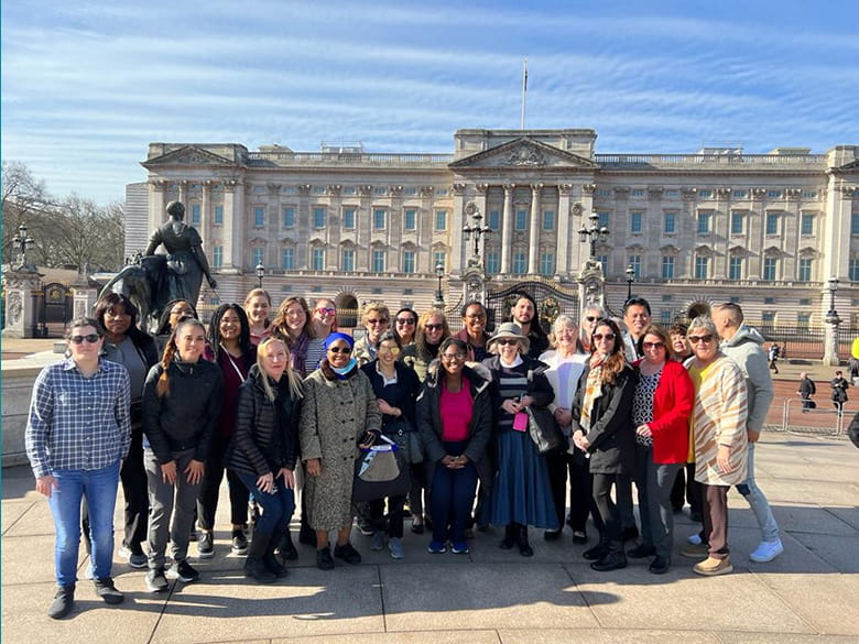 DNP students and faculty posing outside in Europe