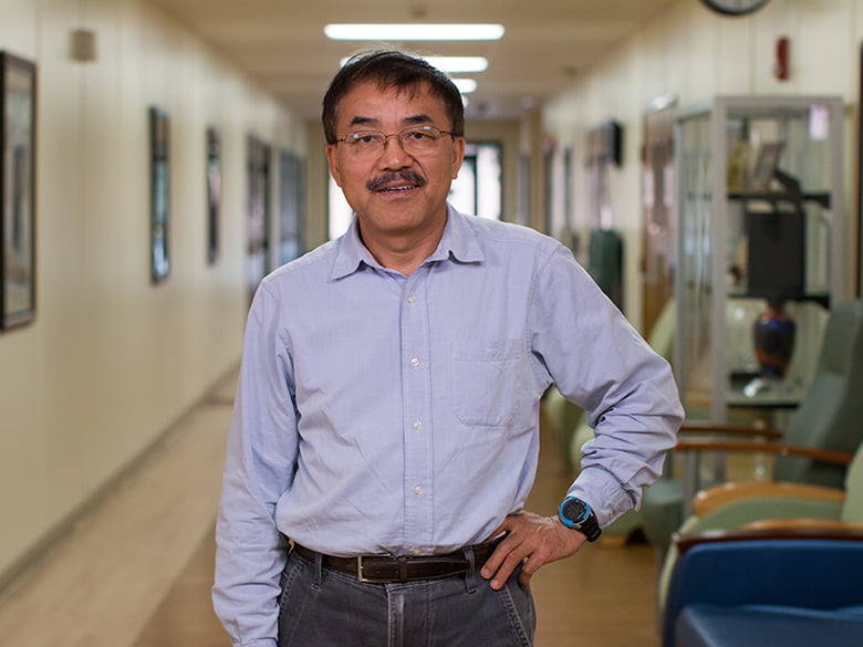 Dr. Yan Xiao portrait in hallway