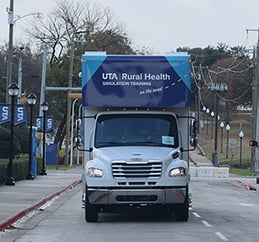 Front of Mobile Simulation Lab coming up the road