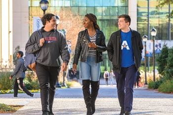 University of Texas at Arlington students walking on campus