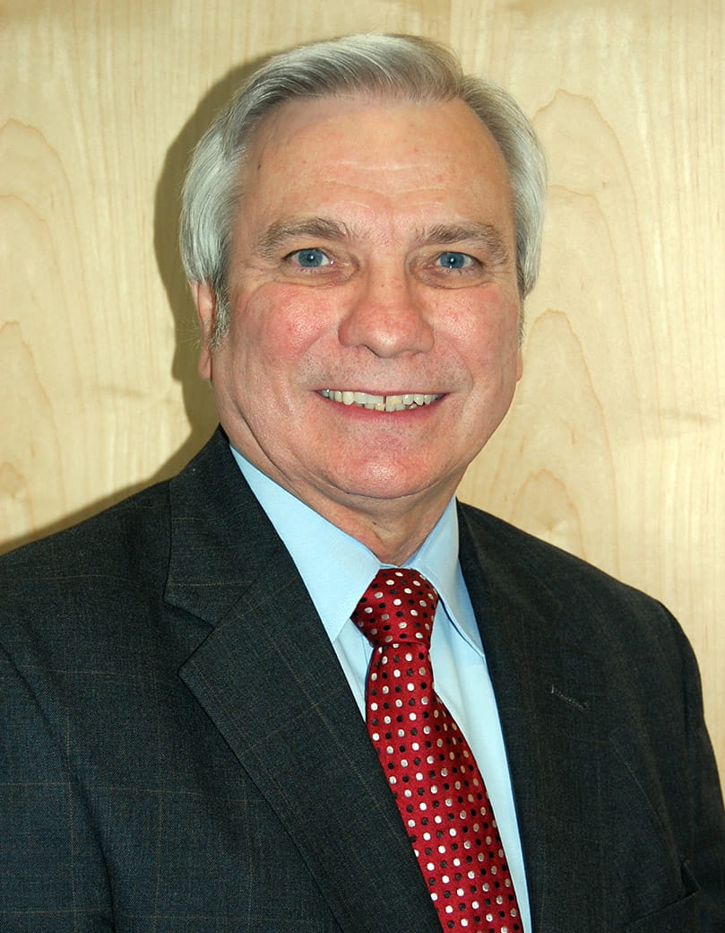 A head and shoulders photo of UTA aerospace engineering alumnus Larry Stephens