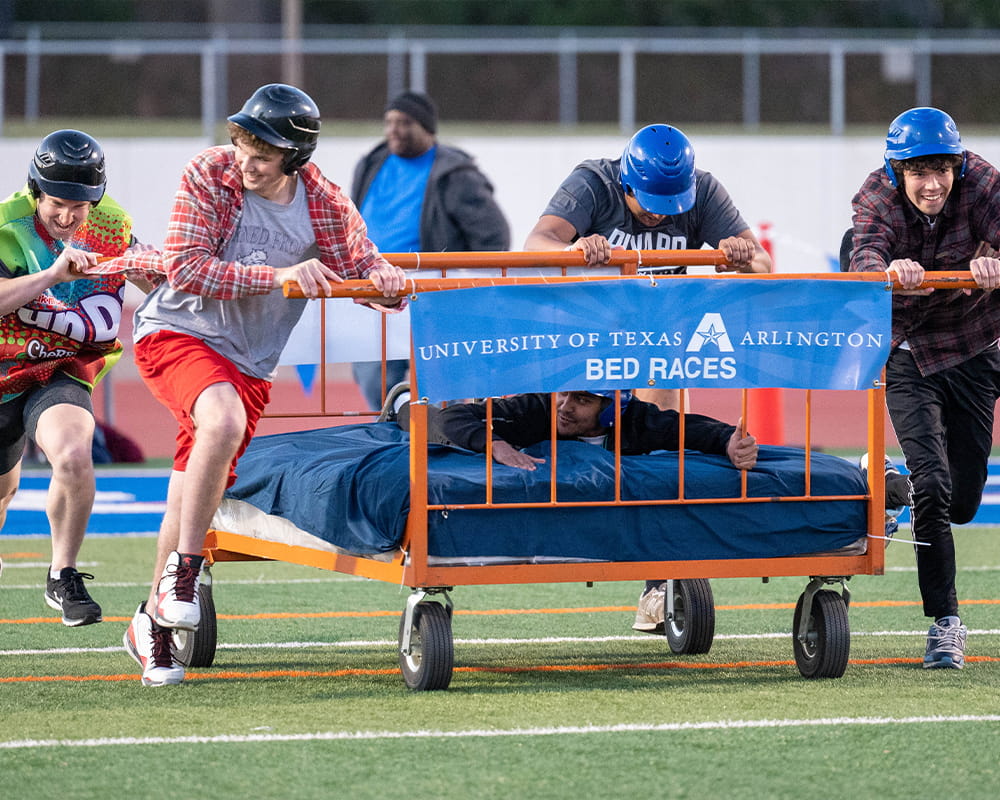 Students participating in the annual Bed Races.