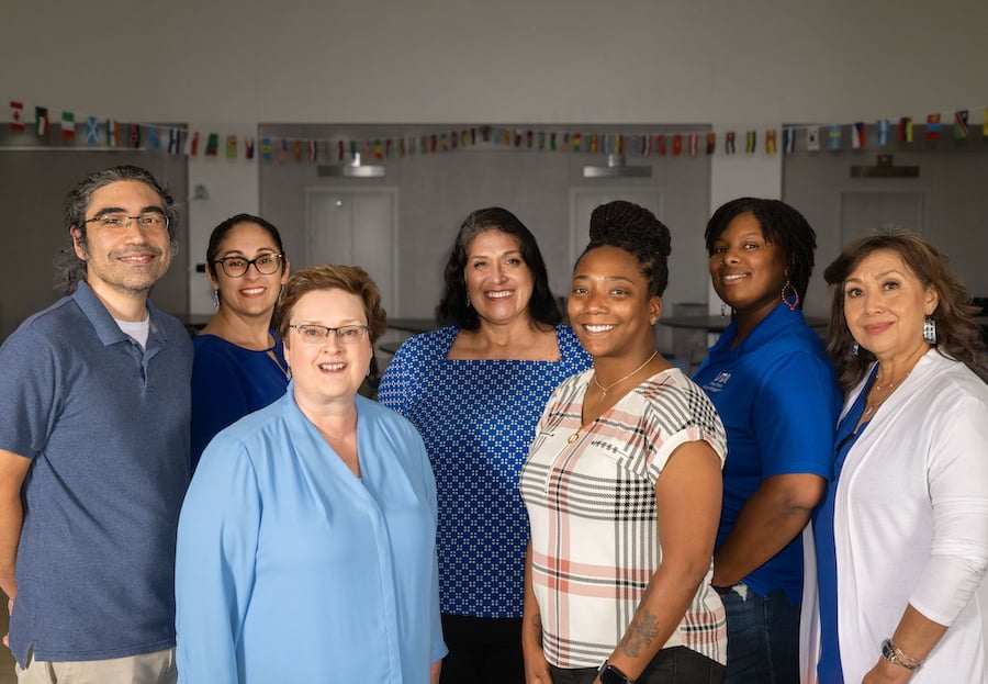 group of people smiling for the camera