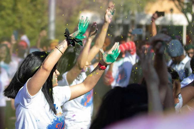 Ladies celebrating Holi festival of colors