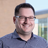 a professional headshot of a man