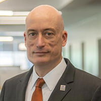 a professional headshot of a man