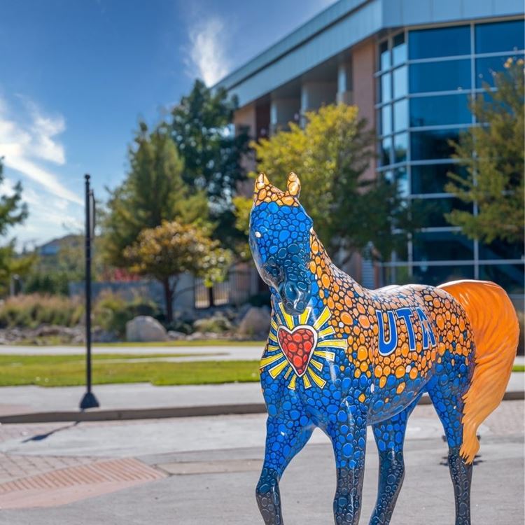Mosaic UTA spirit horse outside College Park Center