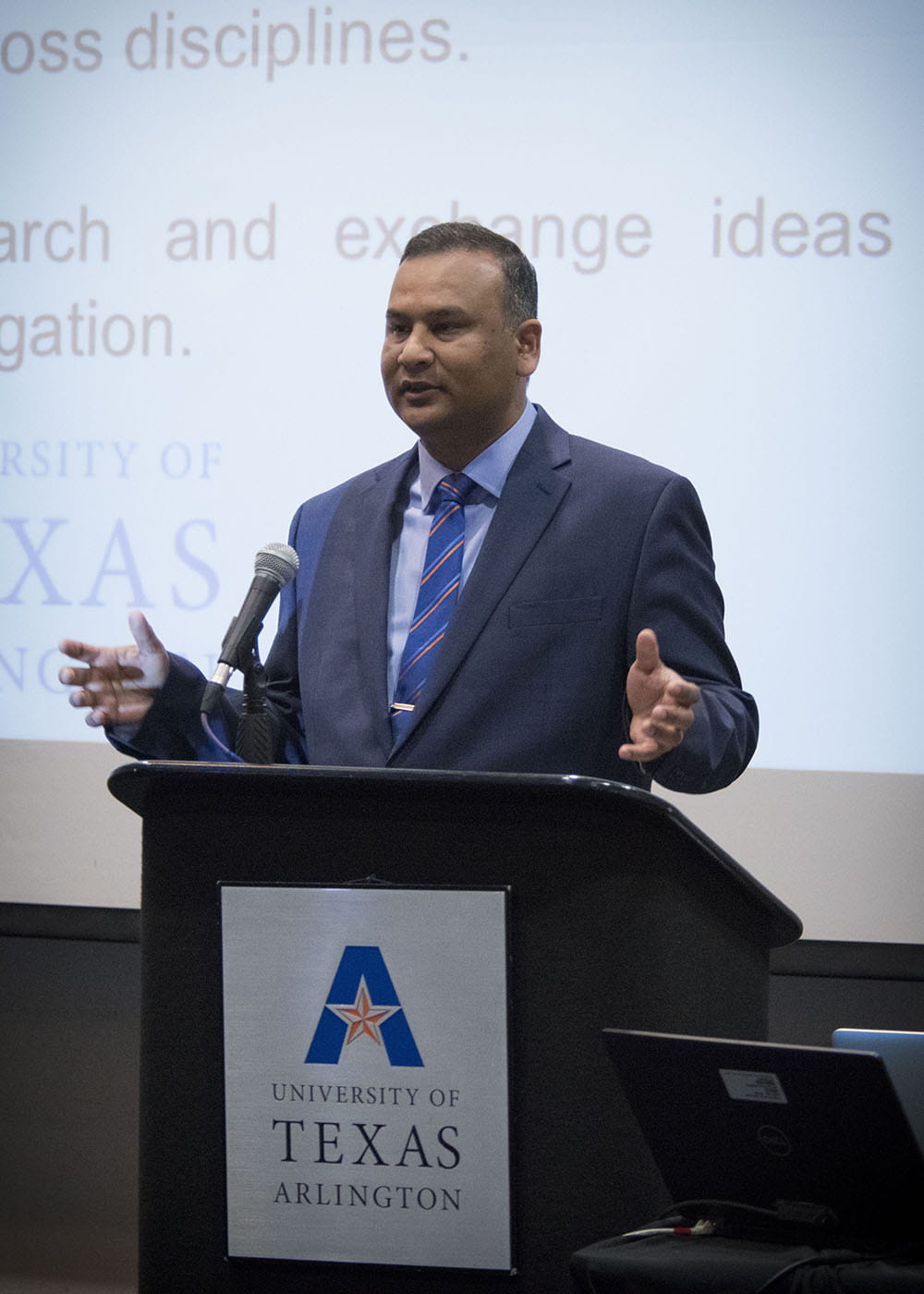 Ashfaq Adnan, associate professor in the UTA Department of Mechanical and Aerospace Engineering, chaired the inaugural symposium.