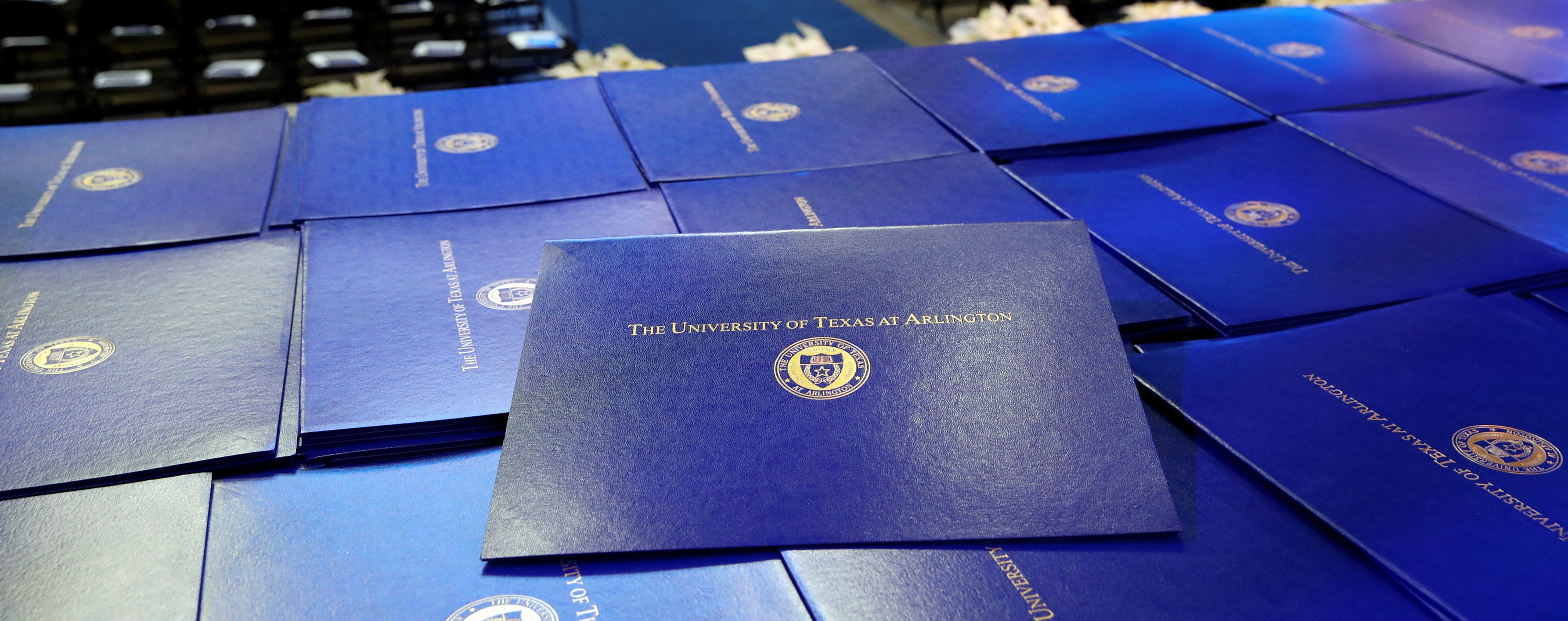 Close up of UTA diploma folders