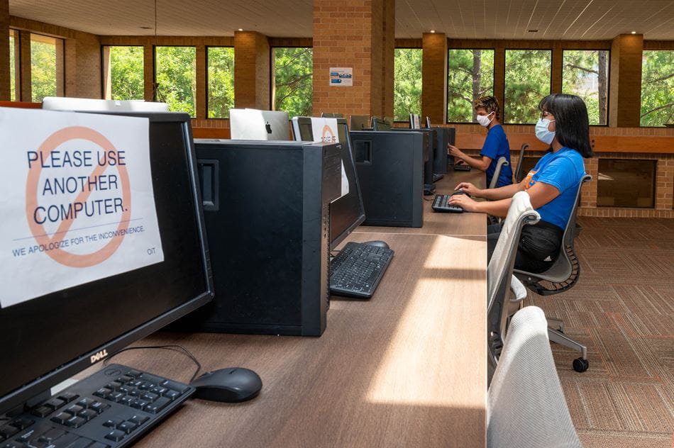 UTA students in socially distant computer lab