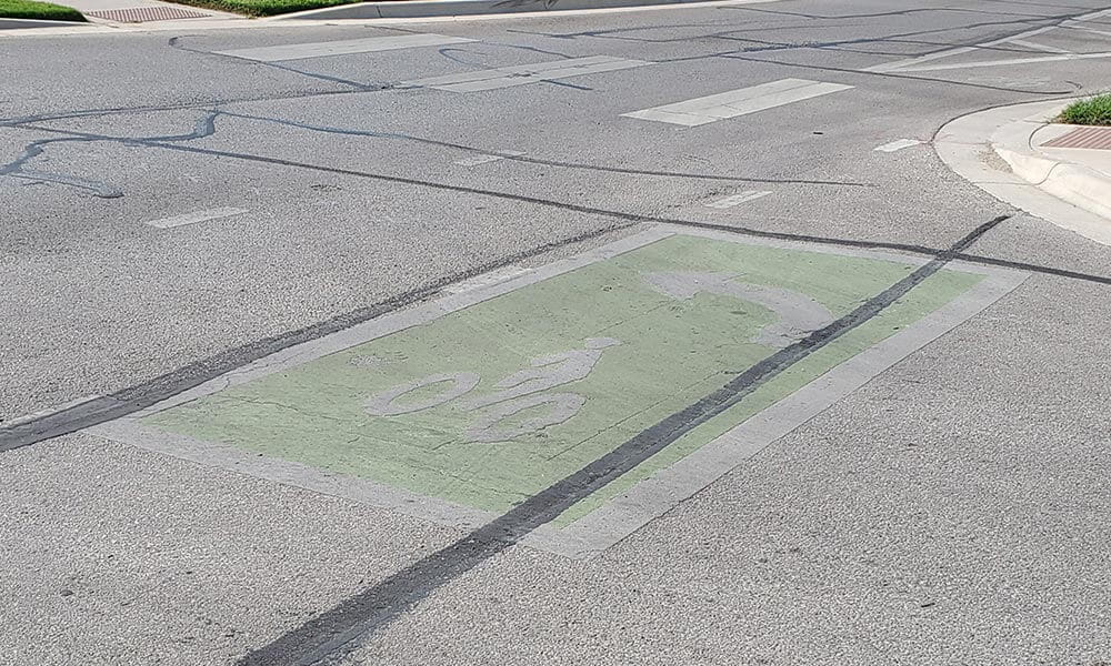 Picture of green pavement" src="https://cdn.web.uta.edu/-/media/project/website/news/releases/2020/09/kam-greenpavement.ashx?la=en&h=4032&w=3024" _languageinserted="true