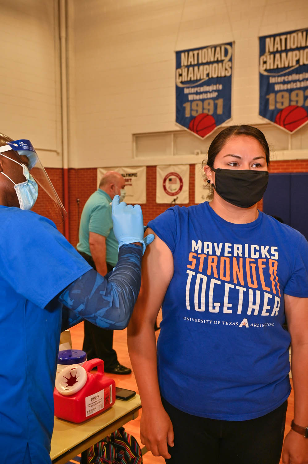 student getting vaccinated 