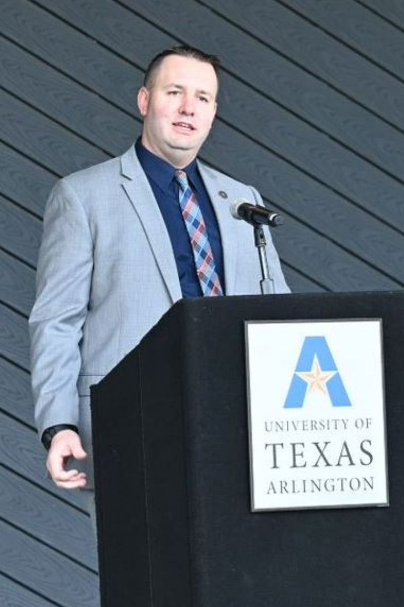 James Kumm makes remarks behind a lectern." _languageinserted="true