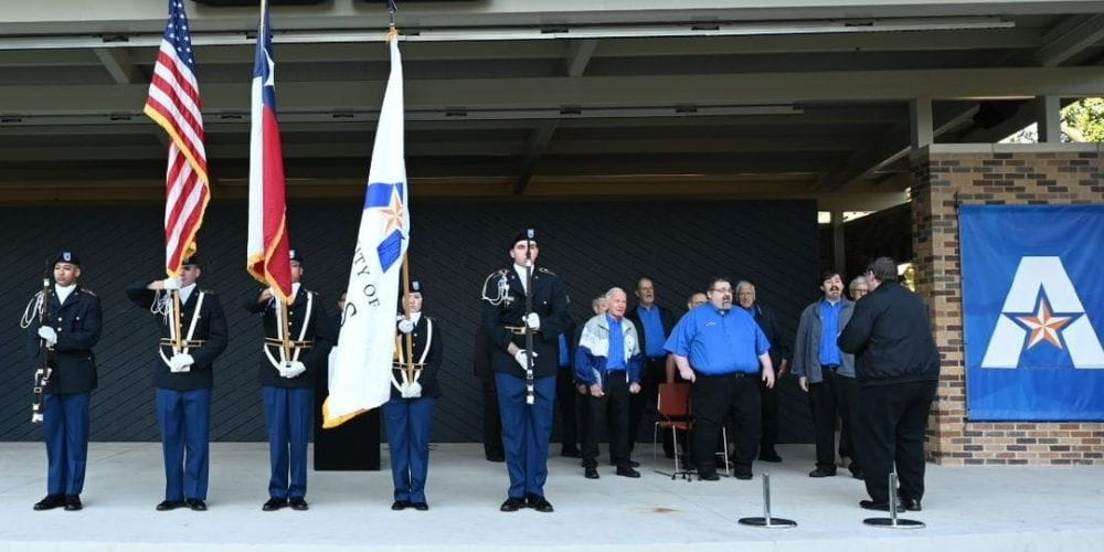Military members present colors at UTA military event." _languageinserted="true
