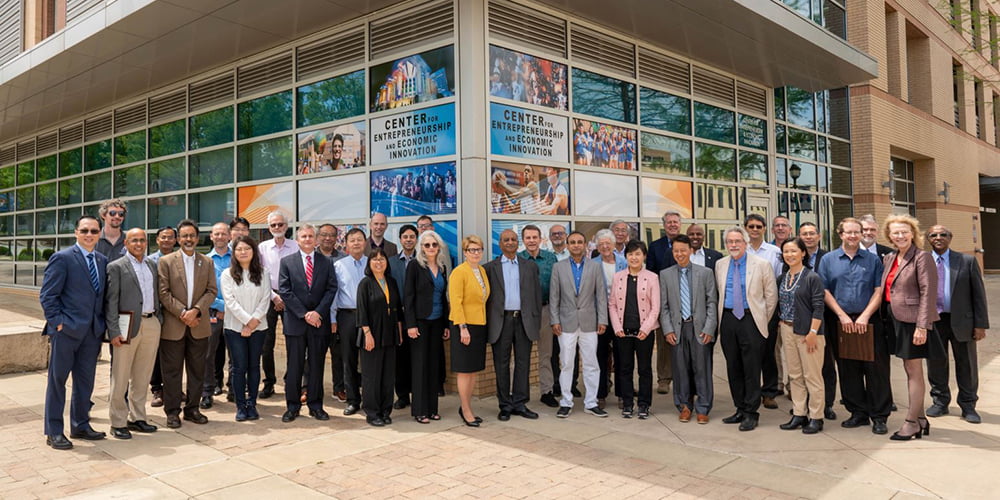 New inductees of the UTA chapter of the National Academy of Inventors stand outside of the Center for Entrepreneurship and Economic Innovation.