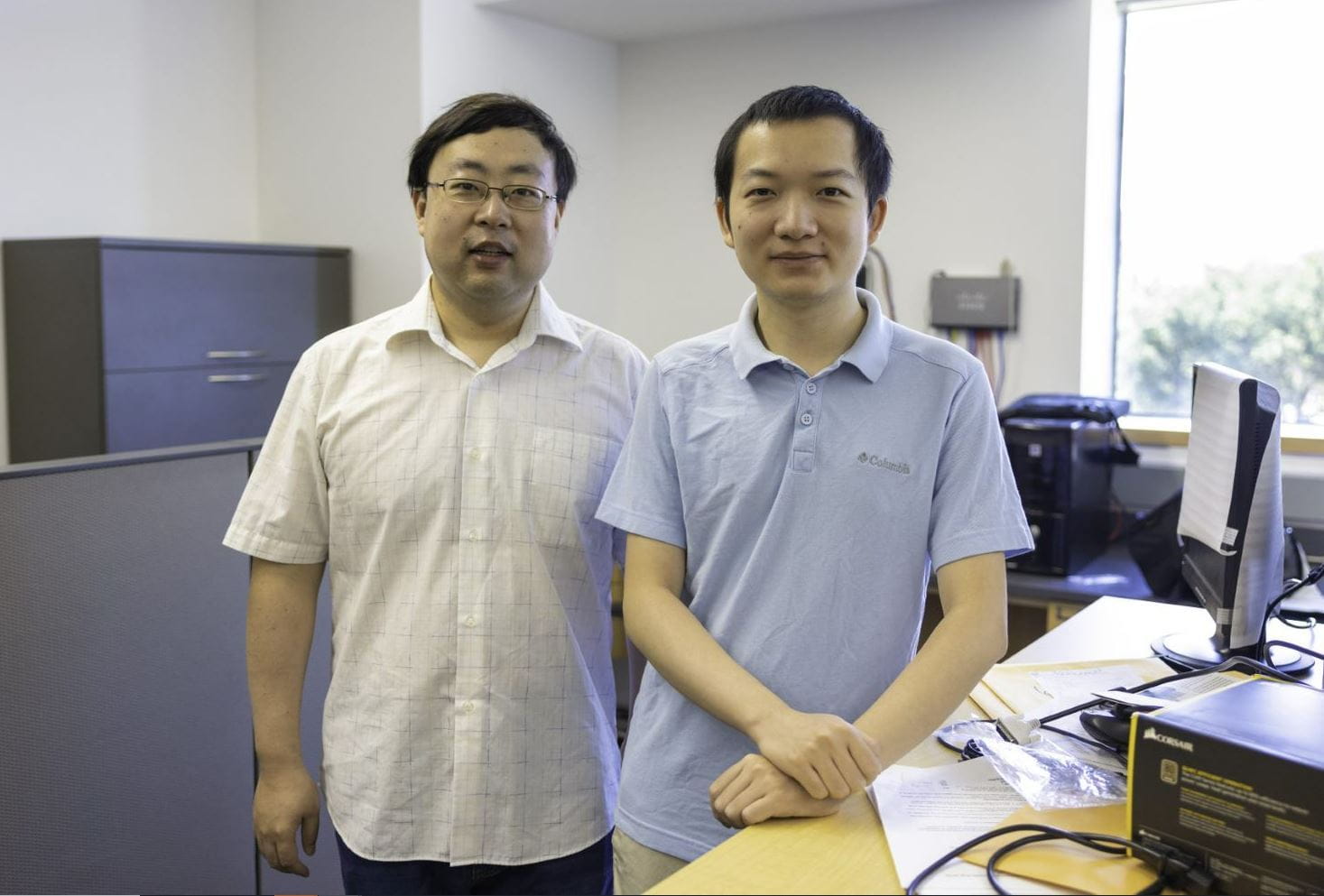 Jiang Ming (left) and Haotian Zhang." _languageinserted="true