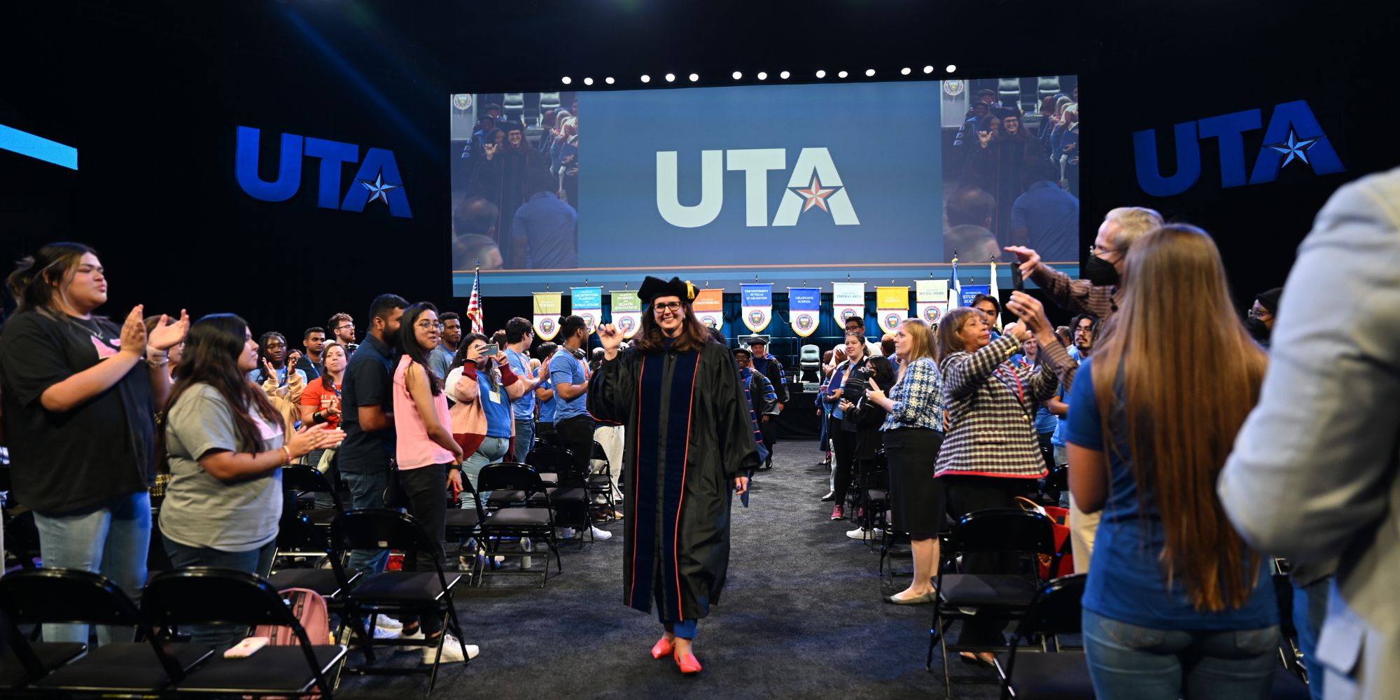 President Jennifer Cowley leaves the ceremony." _languageinserted="true