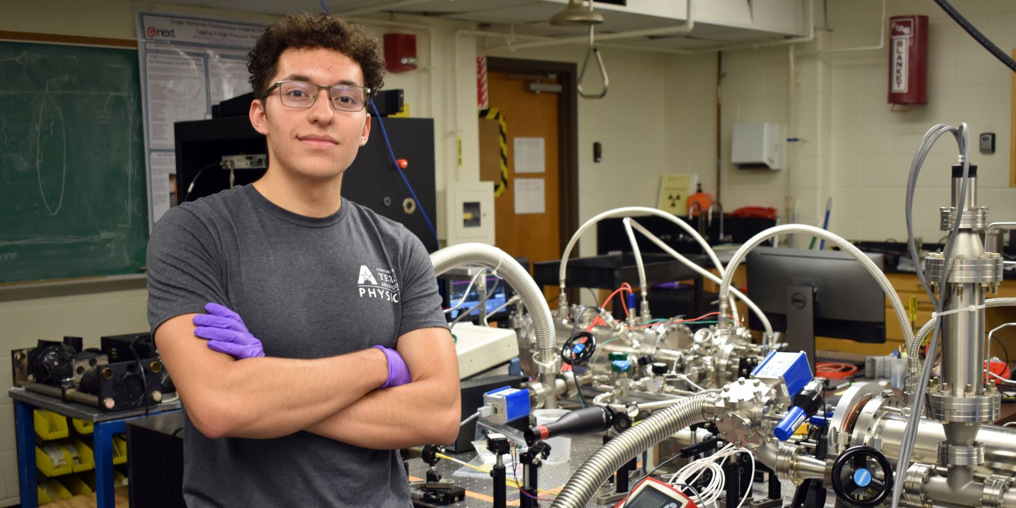 Javier Samaniego stands in the NuRES lab." _languageinserted="true