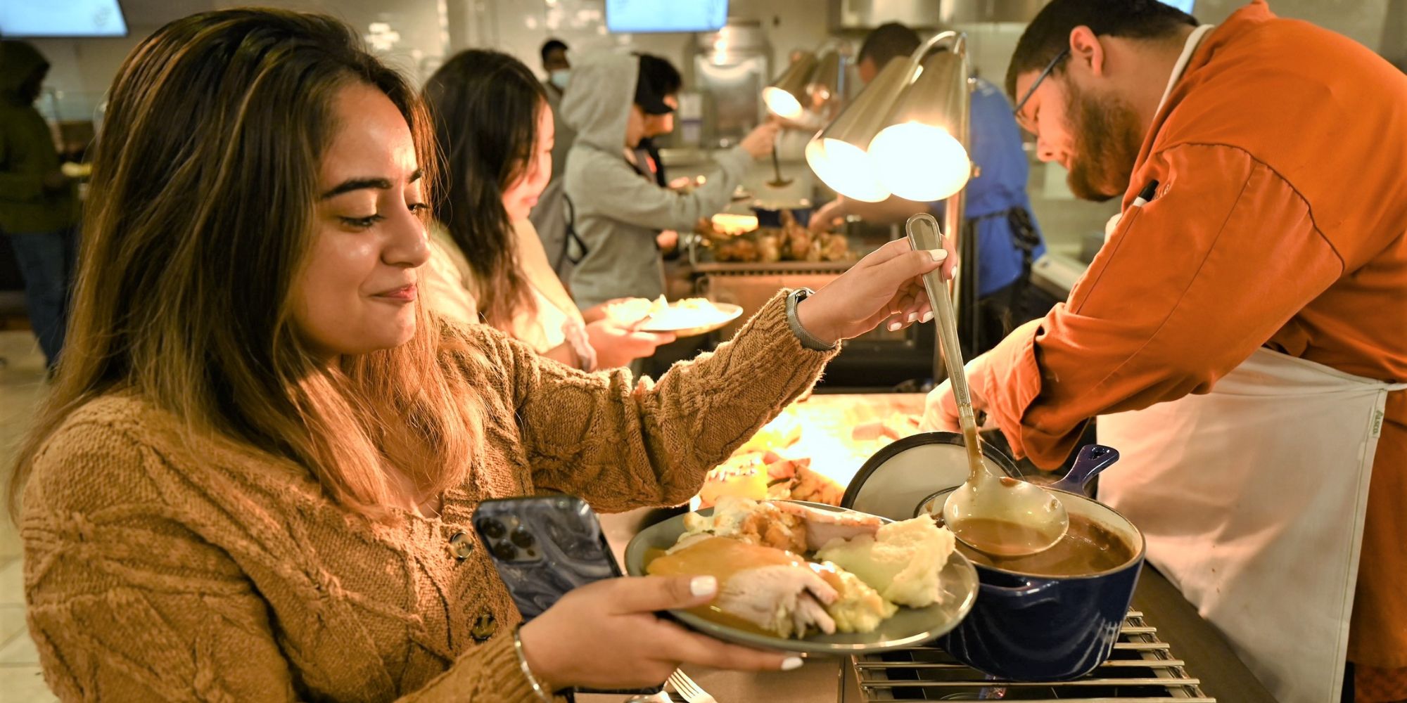 Tanya Bedi enjoys a Thanksgiving dinner at UTA.