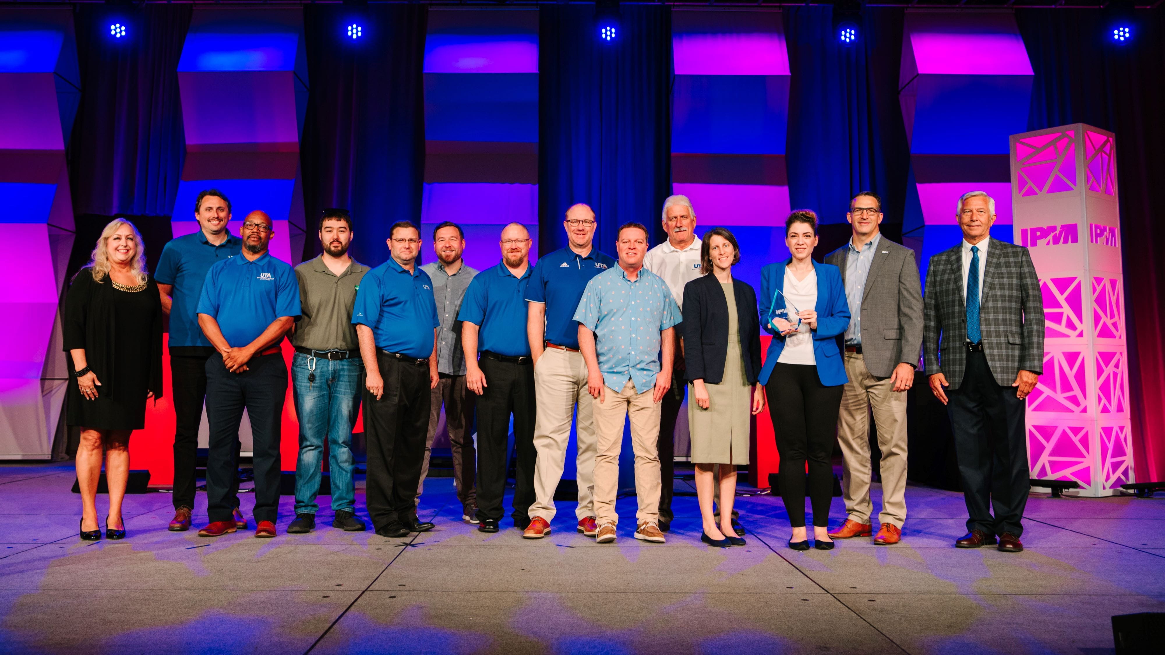 The University of Texas at Arlington received an Award of Excellence for Innovation from the International Parking & Mobility Institute." _languageinserted="true