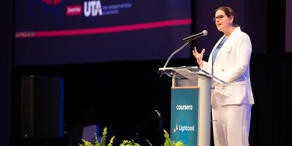 UTA President Jennifer Cowley delivers remarks during DFW Summit" _languageinserted="true