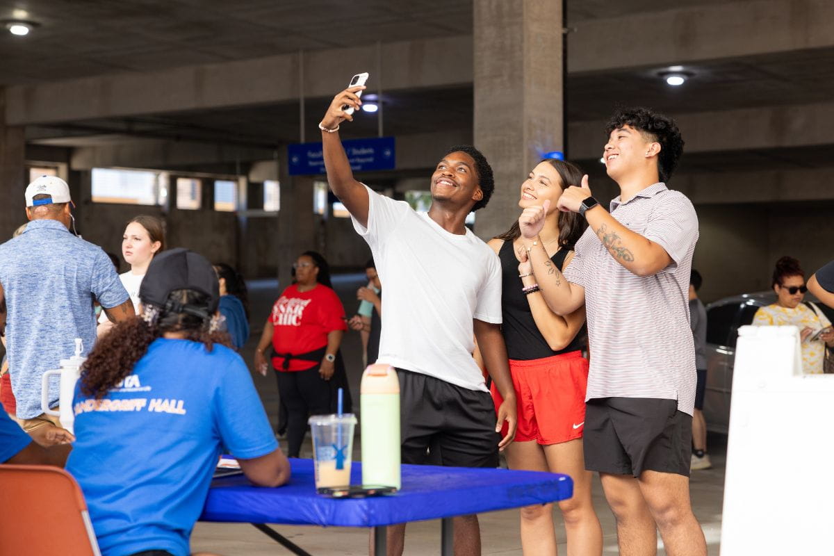 students taking selfie