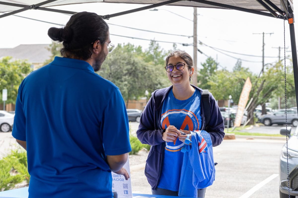 Students engage in conversation at 2024 Veteran Resource Fair