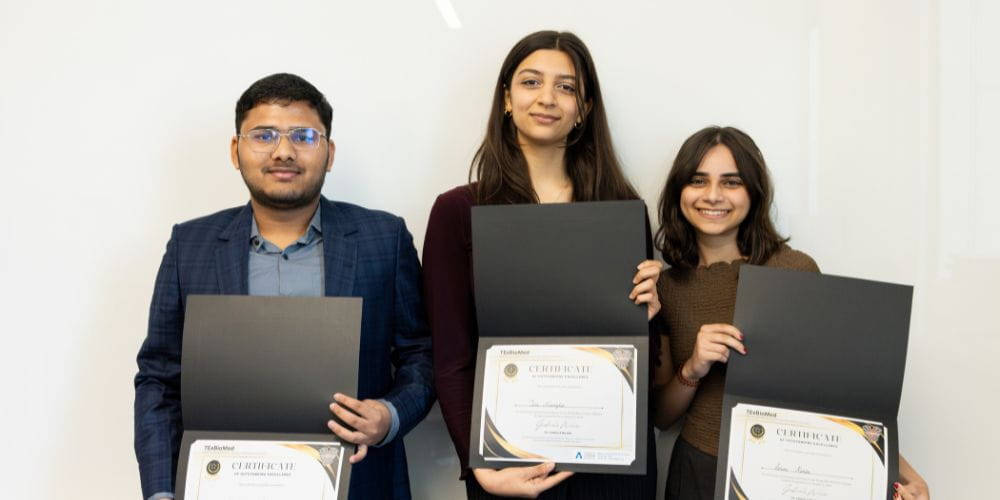 UTA student Get Phit presentation winners. From left, Hemshankar Laugi, Tara Movaghar and Serena Karim" _languageinserted="true